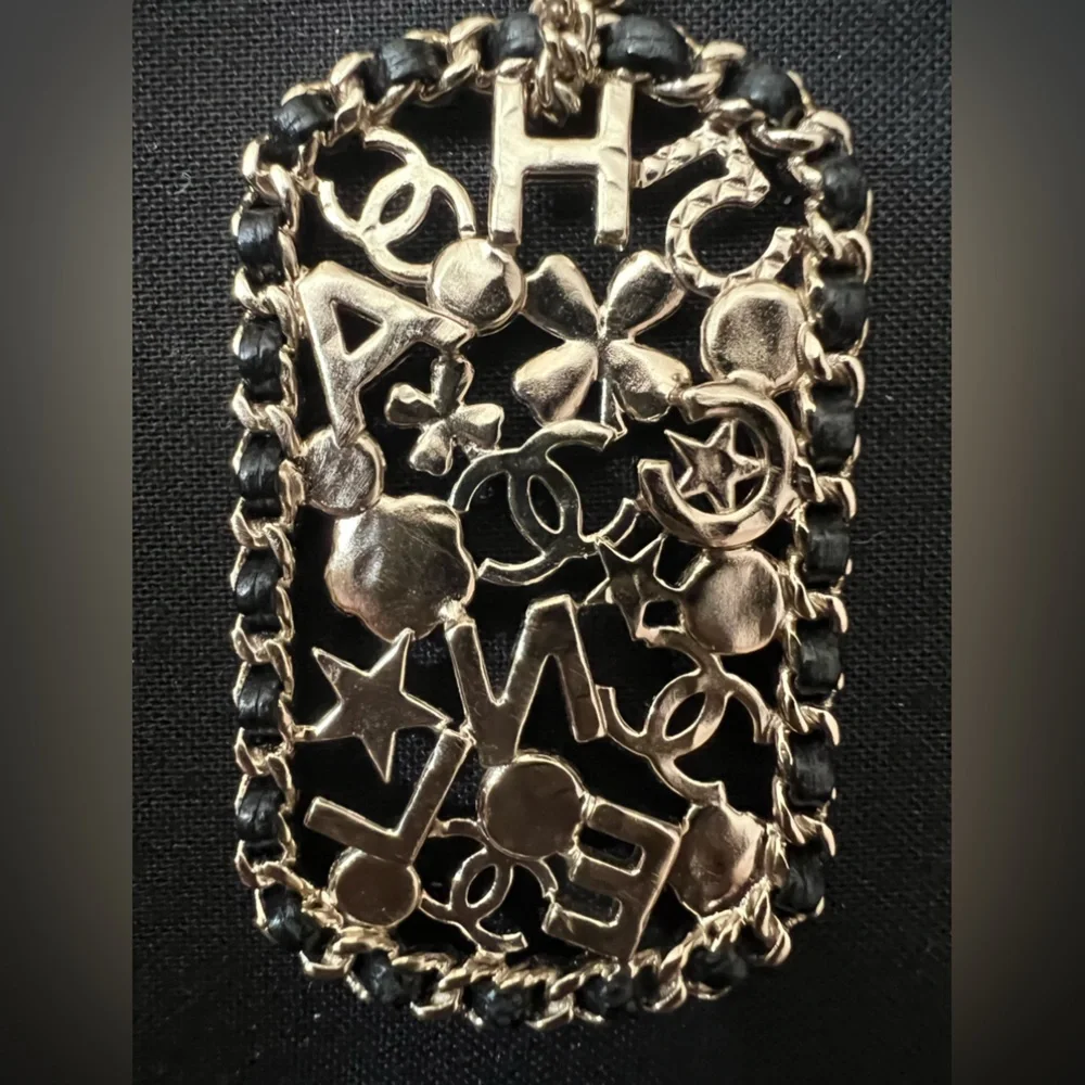 CHANEL Pendant Necklace Clover Lambskin Leather Chain Logo Crystal Mosaic Pearl